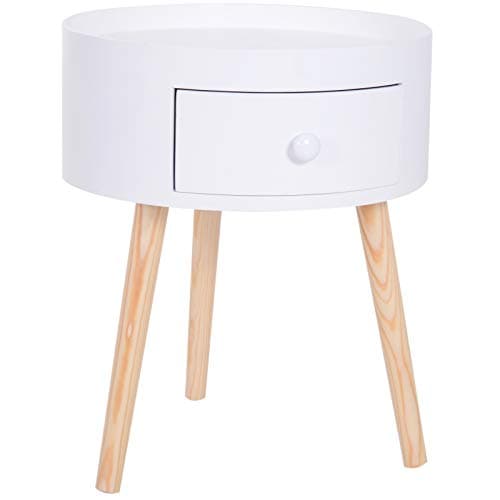 Round Nordic bedside table with white and wood legs for a teenage girl's bedroom