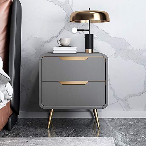 Girl's bedside table in grey and gold with drawers and long legs in solid Nordic design