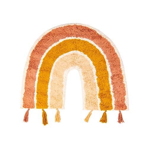 Orange rainbow shaped rug for a girly bedroom