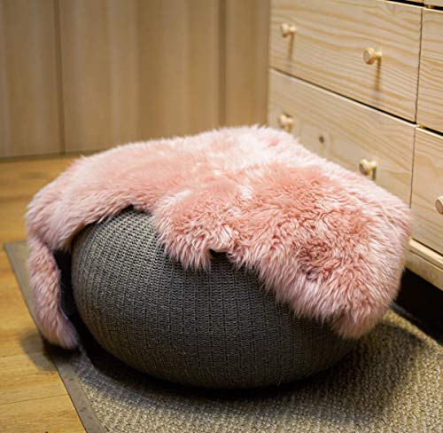 Pink sheepskin cosy carpet