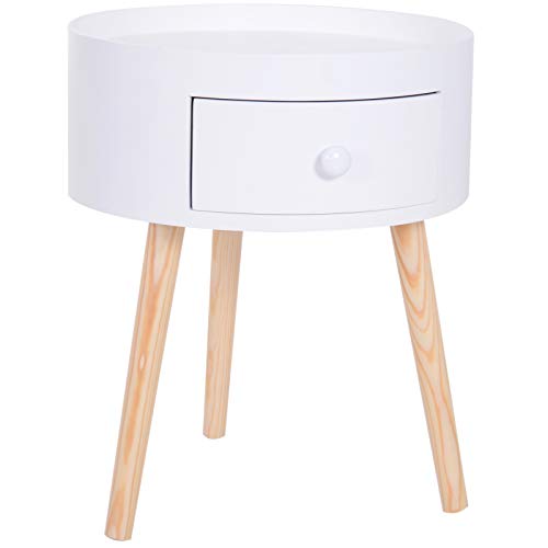 Round Nordic bedside table with white and wood legs for a teenage girl's bedroom