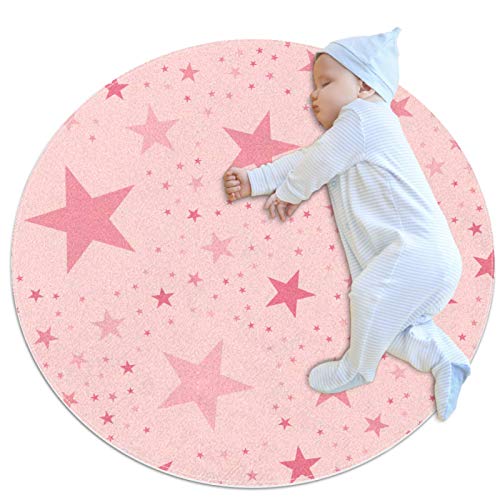 Round pink carpet with stars for a girl's bedroom