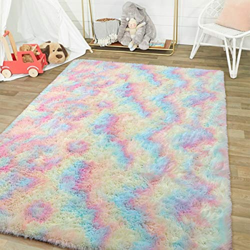 Soft rainbow fluffy area rug for a girly bedroom